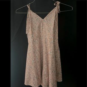 Size Extra Small, Pink with different colored flowers